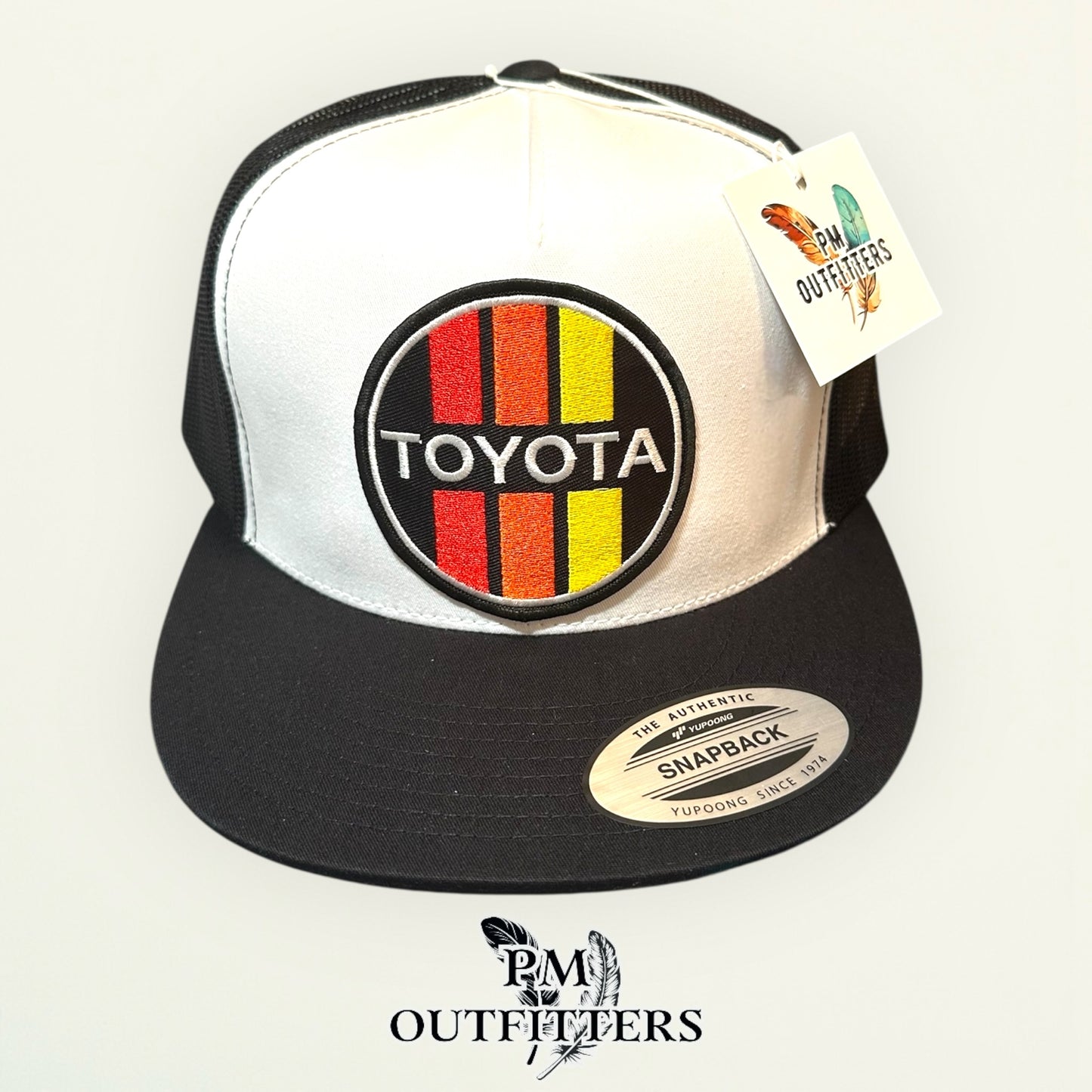 Toyota Retro Stripes Trucker Hat — PM Outfitters Racing Patch | Yupoong Flat Bill White Black Motorsports Heritage
