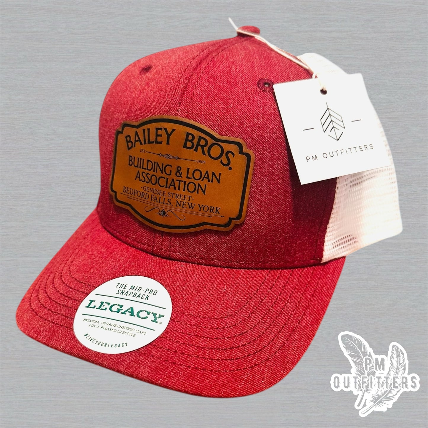 Custom Bailey Brothers Building & Loan Patch Hat – Maroon & White Legacy Mid-Pro Snapback | PM Outfitters