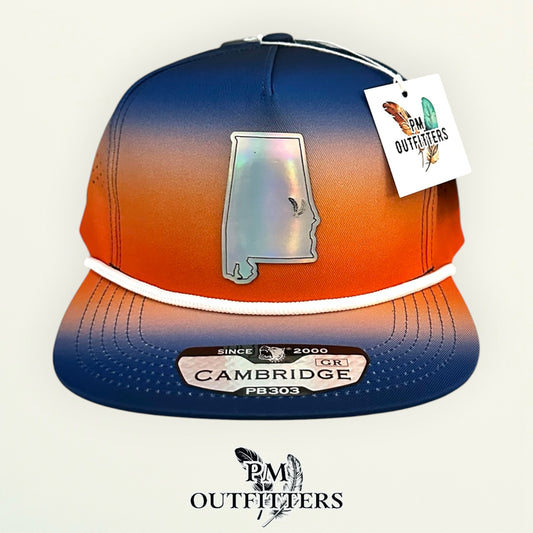 PM Outfitters Auburn Tailgate Season holographic vegan leather Alabama state outline patch trucker hat Auburn two-feather logo blue orange gradient