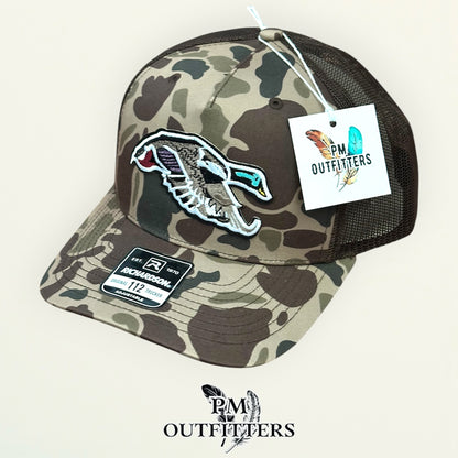 PM Outfitters hang tag Classic Duck trucker hat Bark Duck camo