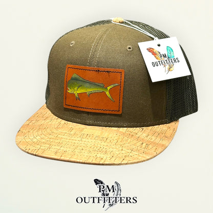 Hand-painted mahi-mahi patch on an olive Otto 141 cork-bill trucker hat, PM Outfitters True Originals