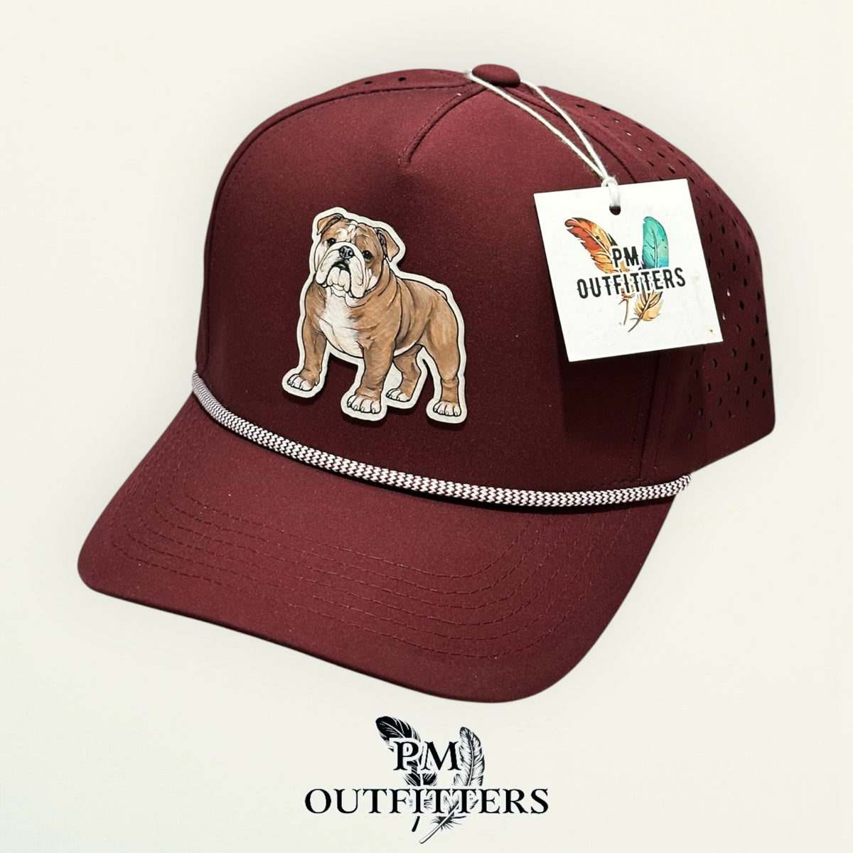 Hand-painted Mississippi State Bulldog performance rope cap displayed with PM Outfitters branded hang tag