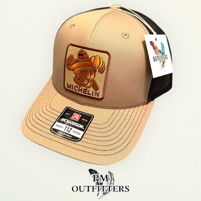 Michelin Man Trucker Hat — Retro Embroidered Patch | Richardson 112 Khaki Brown