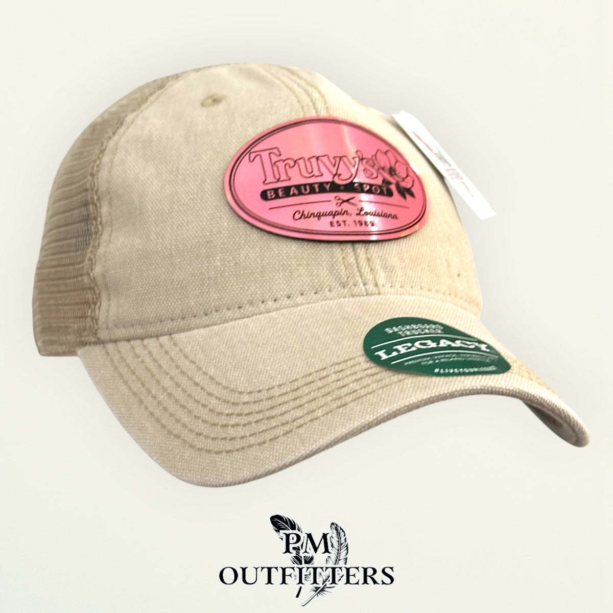 Steel Magnolias Truvy's trucker hat profile view beige canvas pink patch