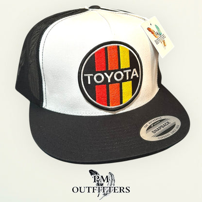 Toyota Retro Stripes Trucker Hat — PM Outfitters Racing Patch | Yupoong Flat Bill White Black Motorsports Heritage