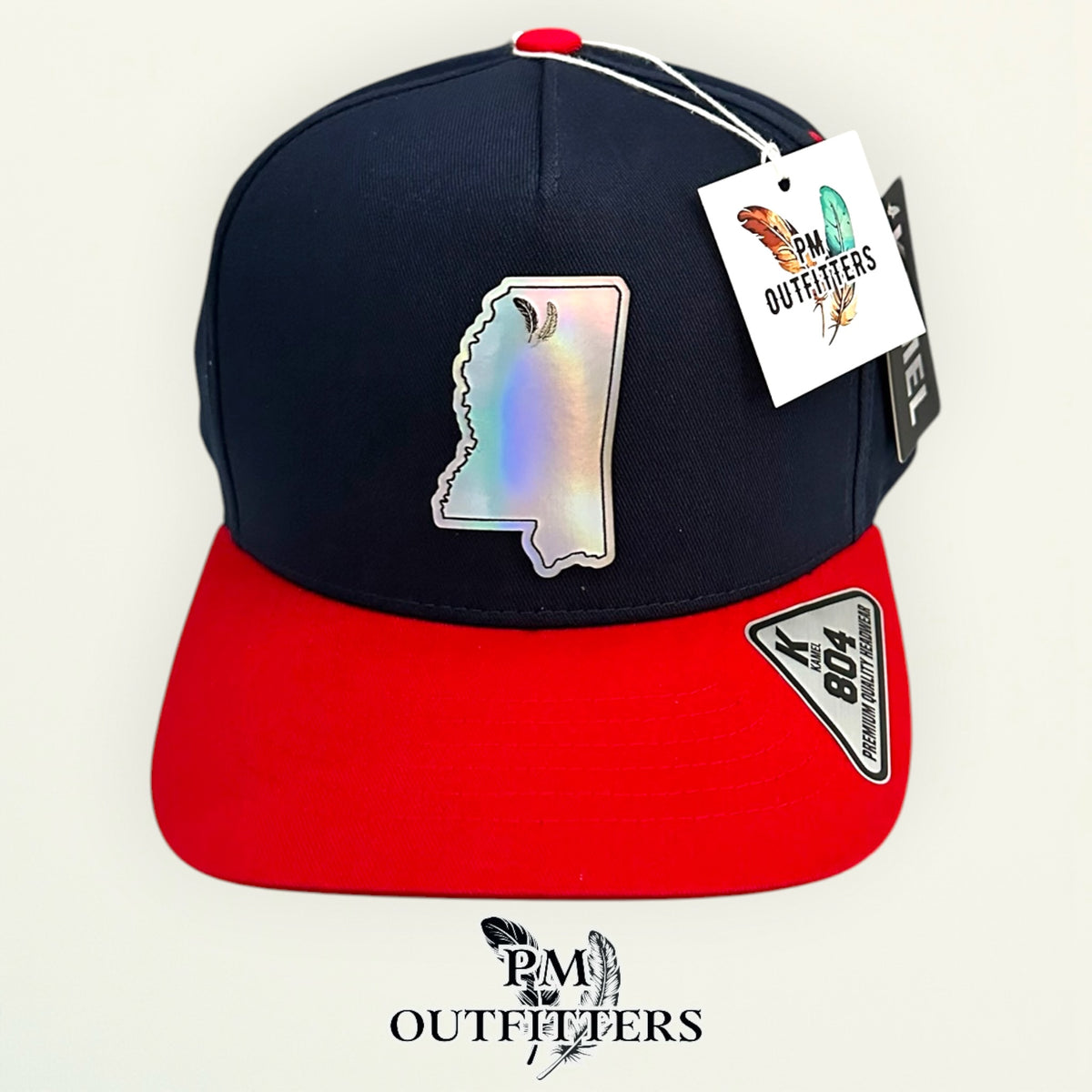 PM Outfitters Ole Miss Tailgate Season holographic vegan leather Mississippi state outline patch trucker hat Oxford two-feather logo navy red