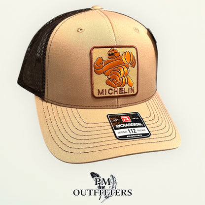 Michelin Man Trucker Hat — Retro Embroidered Patch | Richardson 112 Khaki Brown