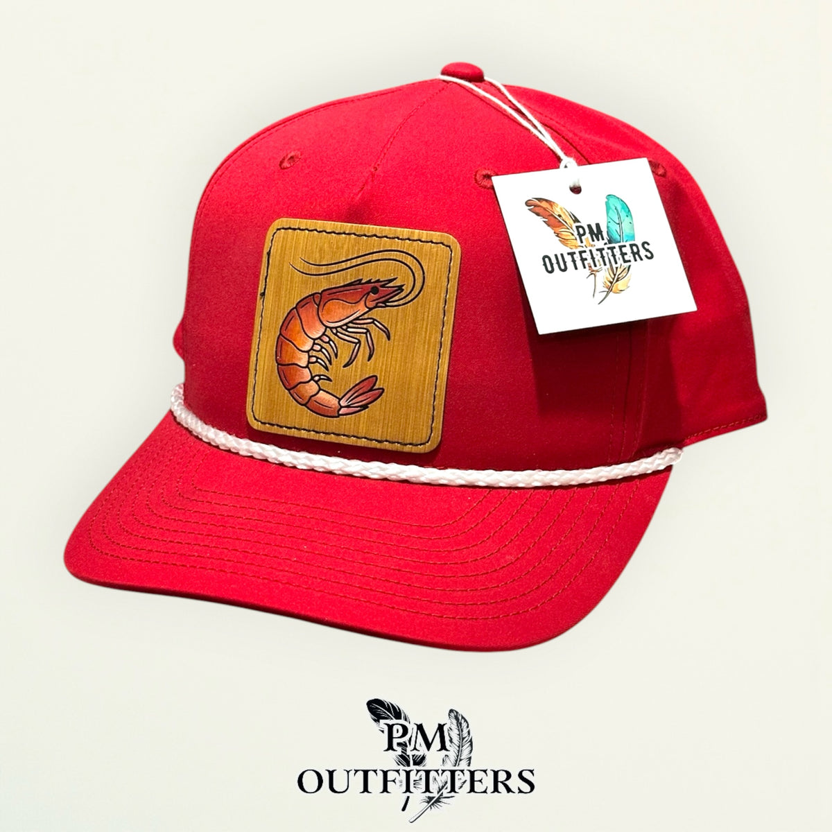 Hand-painted Gulf shrimp patch on a red Richardson 258 rope trucker hat with white trim, PM Outfitters True Originals