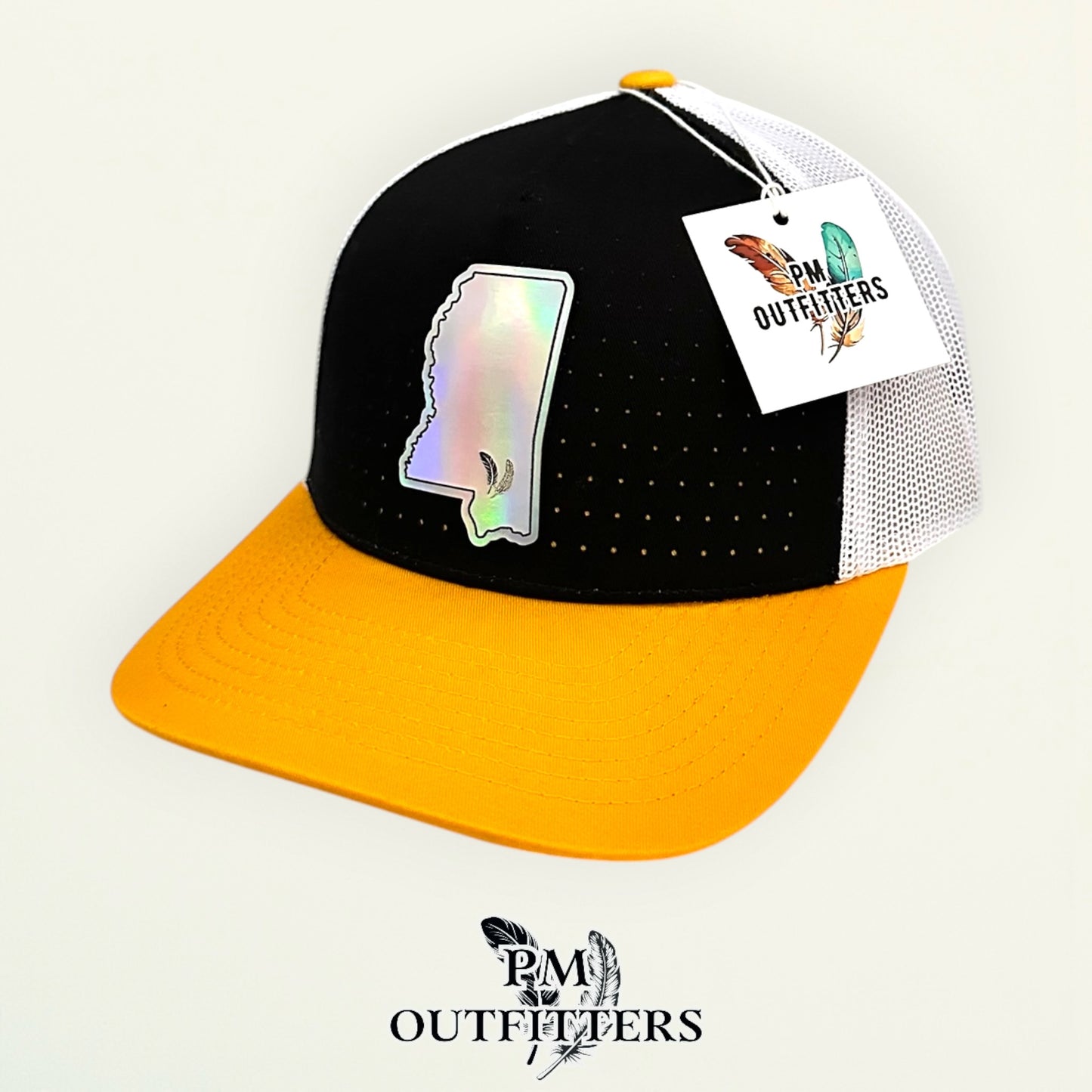 PM Outfitters Southern Miss Tailgate Season holographic vegan leather Mississippi state outline patch trucker hat Hattiesburg two-feather logo black gold