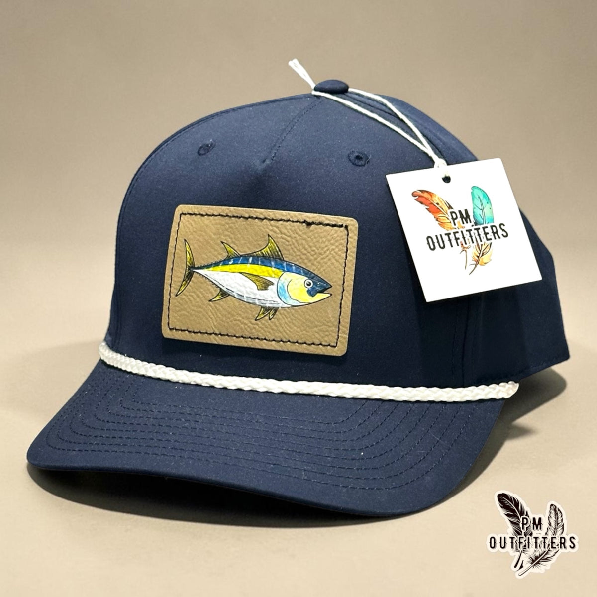 Hand-painted yellowfin tuna patch on a navy Richardson 258 performance rope cap, PM Outfitters True Originals