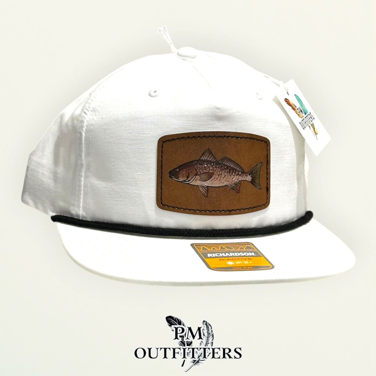 White Richardson 256 performance rope cap with hand-painted redfish patch, angled view, PM Outfitters True Originals
