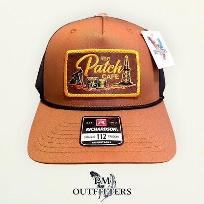 The Patch Cafe Oilfield Trucker Hat | Richardson 112 Rope | Caramel Black | Landman Hat