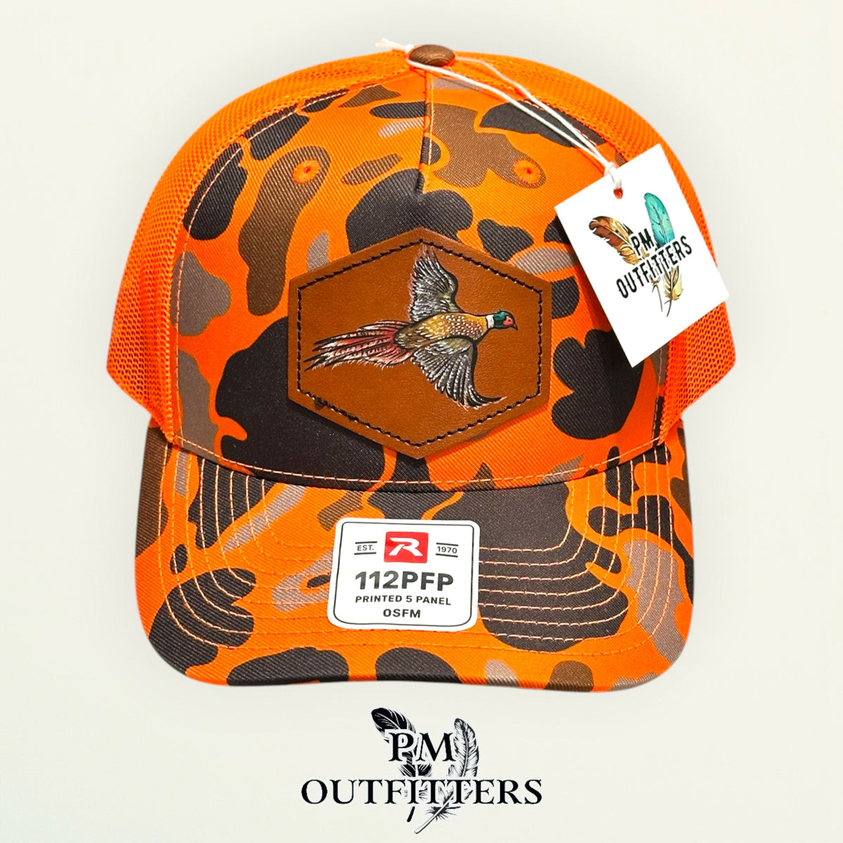 Hand-painted Pheasant patch on a blaze duck camo Richardson 112PFP trucker hat, PM Outfitters True Originals