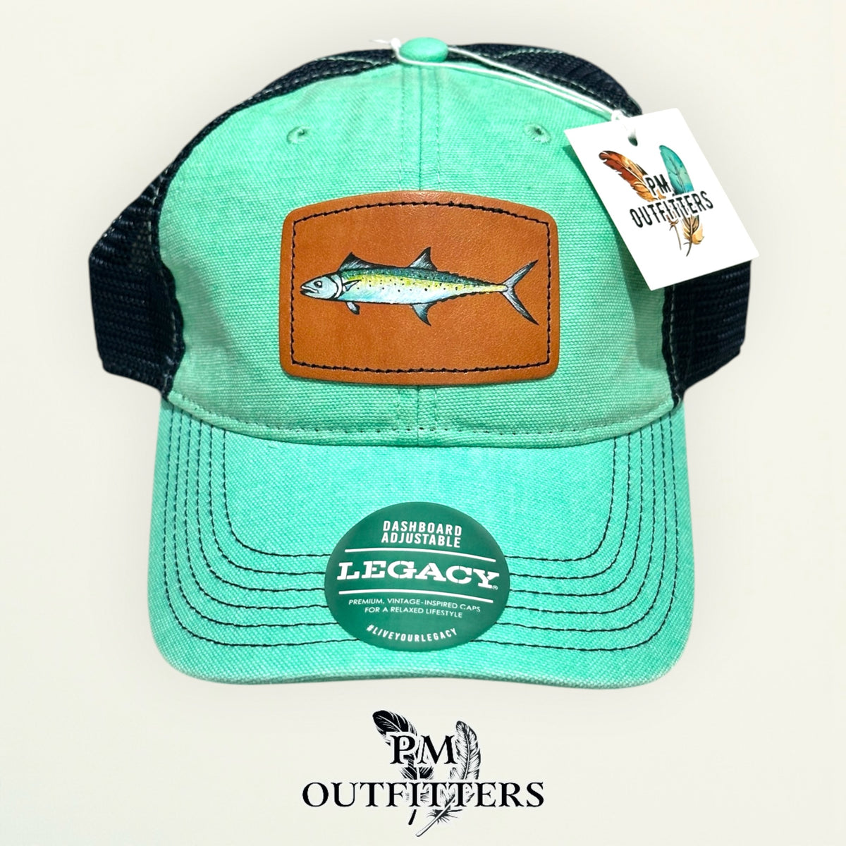 Hand-painted Spanish mackerel patch on a mint Legacy Dashboard trucker hat with black mesh back, PM Outfitters True Originals