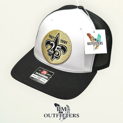 New Orleans Saints 25th Anniversary Trucker Hat | PM Outfitters Richardson 112 White & Black | Who Dat Fan Gear
