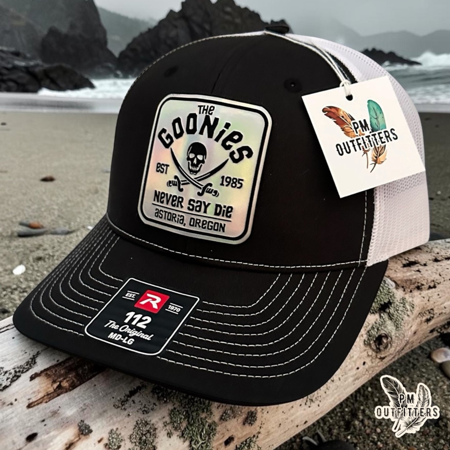 The Goonies Never Say Die Trucker Hat – PM Outfitters Holographic Vegan Leather Patch | Richardson 112 Black White