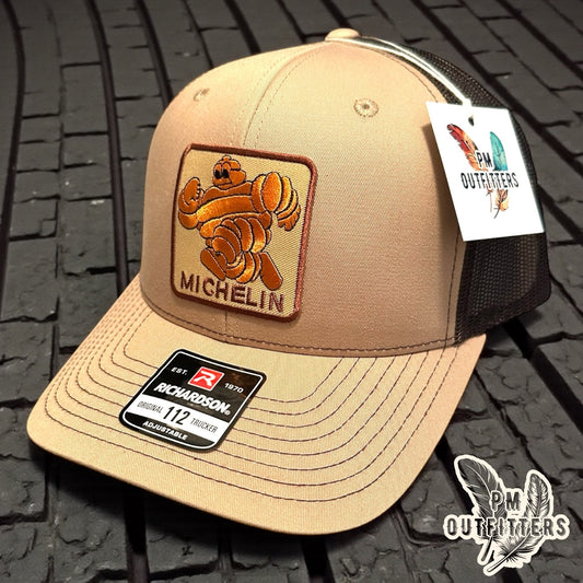 Michelin Man Trucker Hat — Retro Embroidered Patch | Richardson 112 Khaki Brown