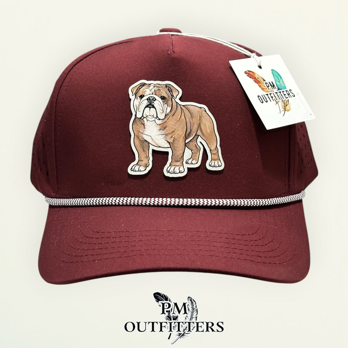 Side view of the hand-painted Bulldog patch on the maroon Dallas 804 rope cap, PM Outfitters True Originals