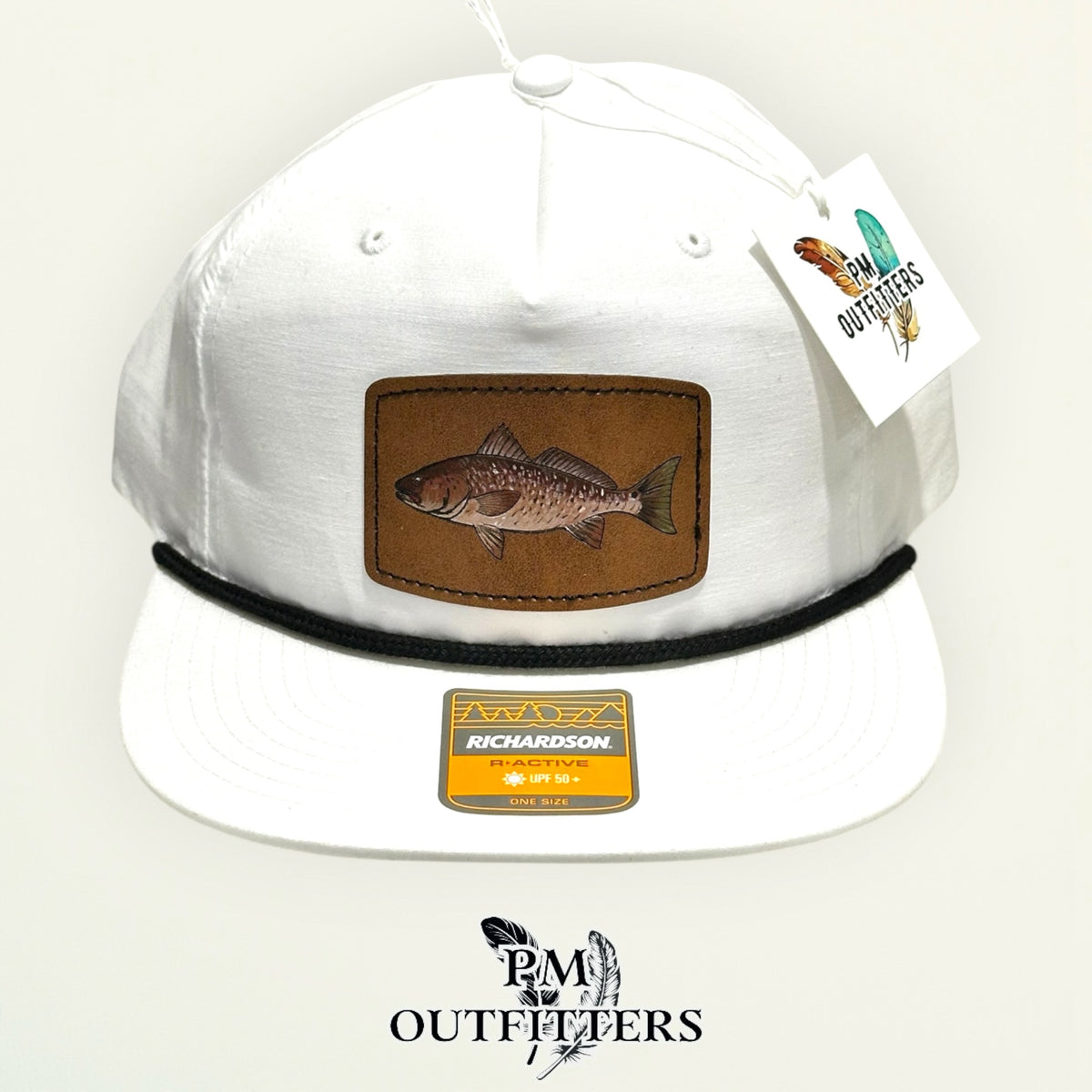 Close-up of the hand-painted redfish patch showing the black tail spot and brushwork detail, PM Outfitters True Originals