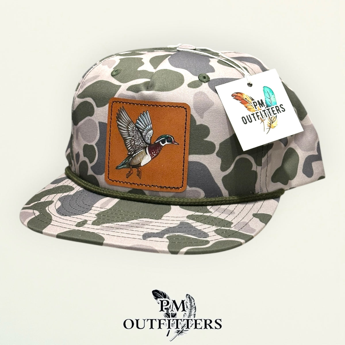 Hand-painted Wood Duck patch on a marsh duck camo Richardson 256P rope trucker hat, PM Outfitters True Originals