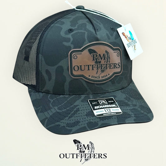 PM Outfitters logo patch detail crossed feathers Since 2024 vegan leather