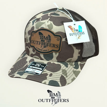 PM Outfitters trucker hat profile view Bark Duck camo brim
