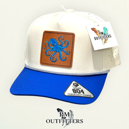 Back of the cream and royal blue Dallas 804 rope cap showing the adjustable snapback closure, PM Outfitters True Originals