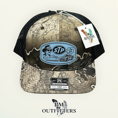 Richard Petty trucker hat profile view Realtree Excape camo brim