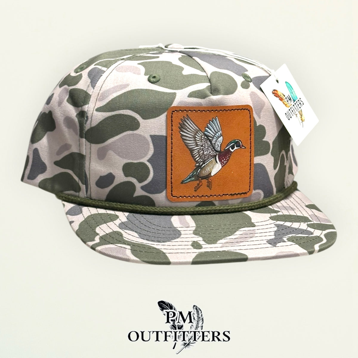 Hand-painted Wood Duck patch on a marsh duck camo Richardson 256P rope trucker hat, PM Outfitters True Originals