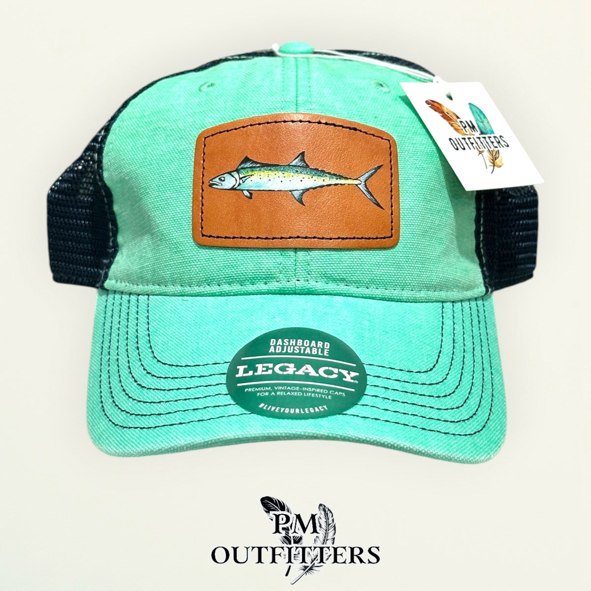 Hand-painted Spanish mackerel patch on a mint Legacy Dashboard trucker hat with black mesh back, PM Outfitters True Originals