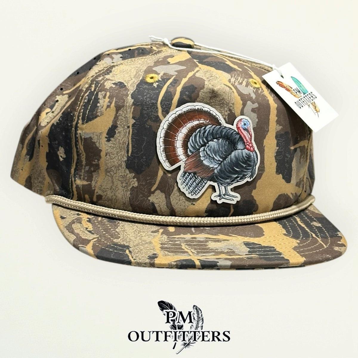Burnt Umber HuntLand camo perforated rope hat with hand-painted wild turkey patch, PM Outfitters True Originals
