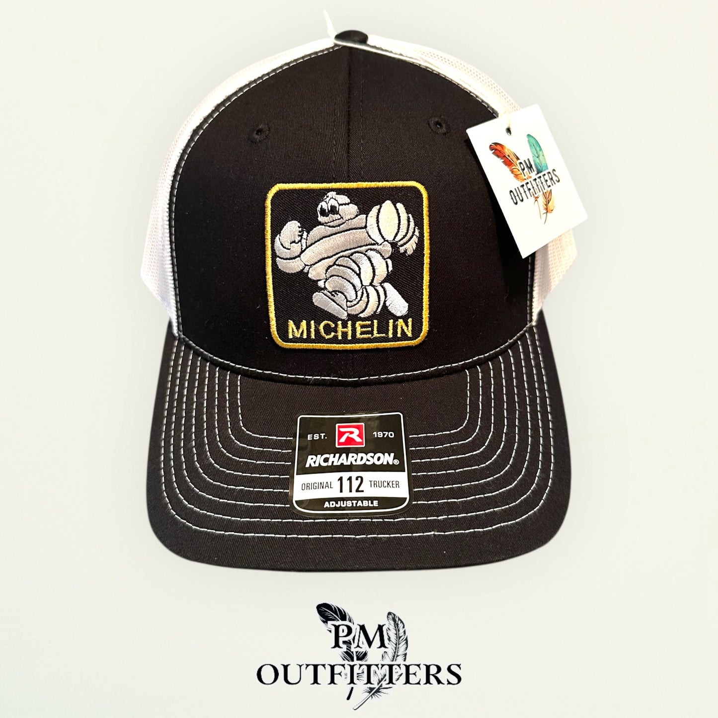 Michelin Man Trucker Hat — Retro Embroidered Patch | Richardson 112 Black White