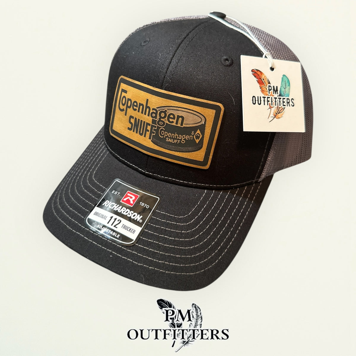 PM Outfitters hang tag Copenhagen Snuff black charcoal trucker hat