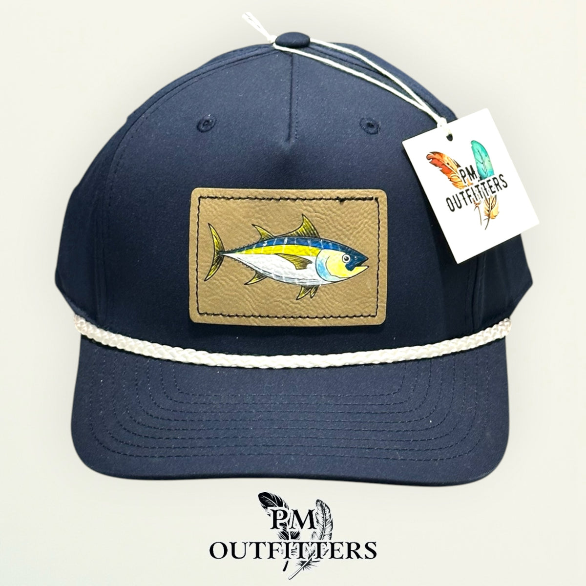 Close-up of the hand-painted yellowfin tuna patch showing brushwork detail, PM Outfitters True Originals