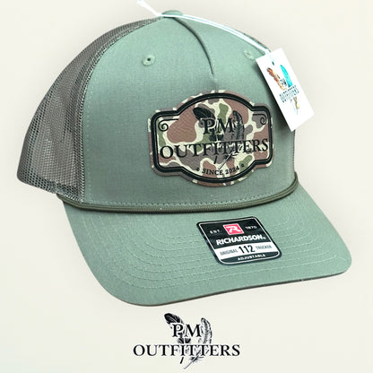 PM Outfitters trucker hat profile view loden green rope brim