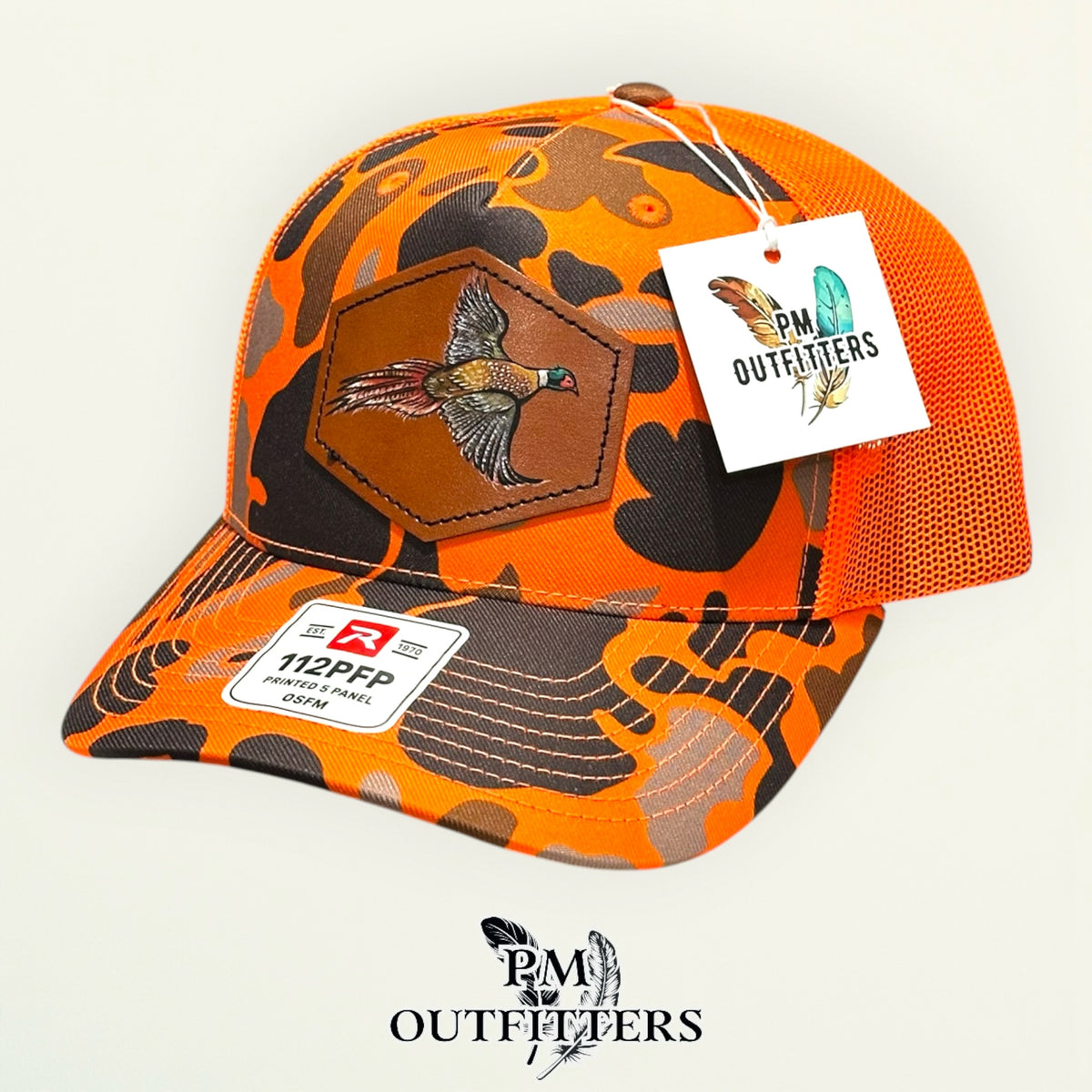 Hand-painted Pheasant patch on a blaze duck camo Richardson 112PFP trucker hat, PM Outfitters True Originals