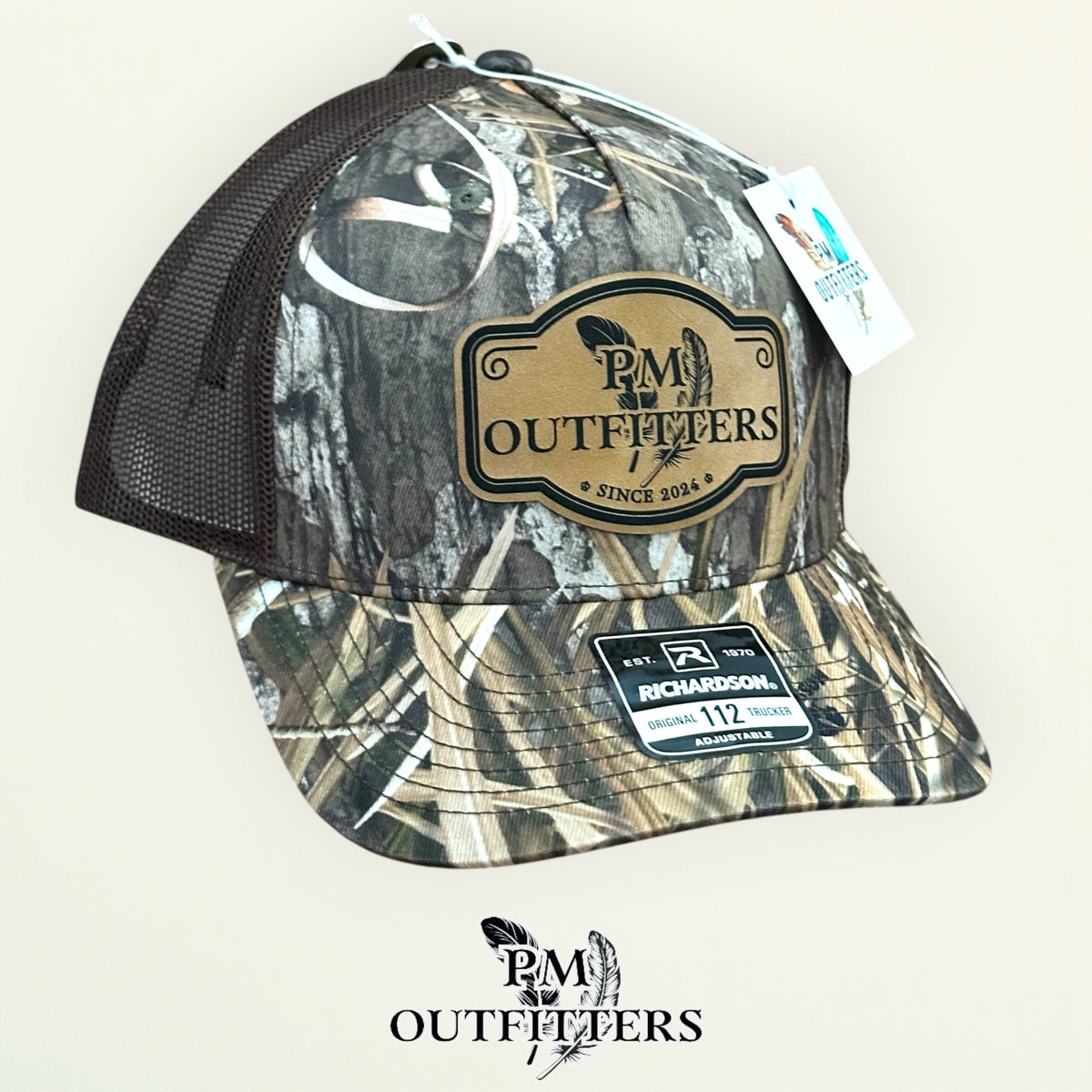 PM Outfitters trucker hat profile view Mossy Oak Habitat camo brim