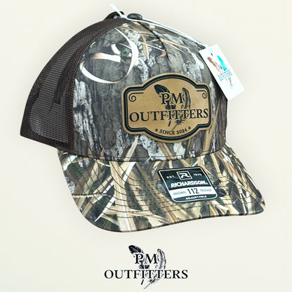 PM Outfitters trucker hat profile view Mossy Oak Habitat camo brim