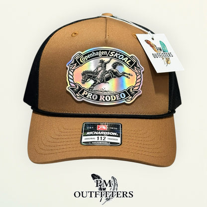 Copenhagen Skoal Pro Rodeo caramel black rope Richardson 112 hat with holographic saddle bronc patch, rotated angle view