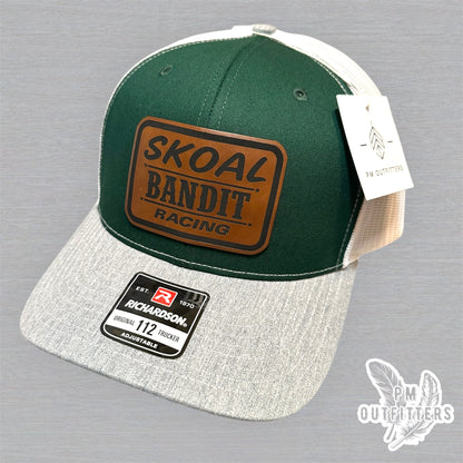 PM Outfitters hang tag Skoal Bandit Racing green gray white trucker hat
