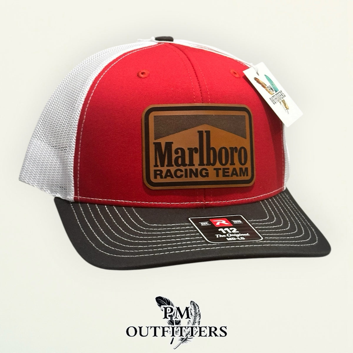 Marlboro Racing Team red black white Richardson 112 trucker hat with tan vegan leather patch, third rotated angle view