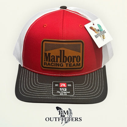 Marlboro Racing Team red black white Richardson 112 trucker hat with tan vegan leather patch, rotated angle view