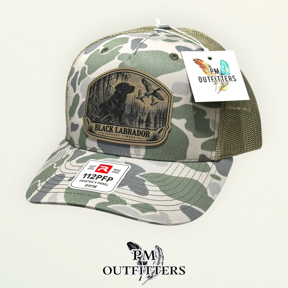 PM Outfitters Black Labrador leather patch Richardson 112PFP Marsh camo hat – right angle