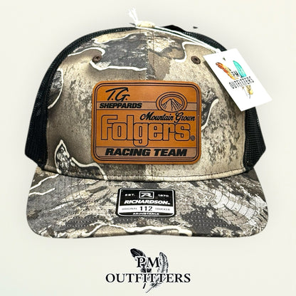 TG Sheppard Folgers Racing Team custom laser-engraved leatherette patch on Richardson 112 Realtree Excape camo and black mesh trucker hat, view 2