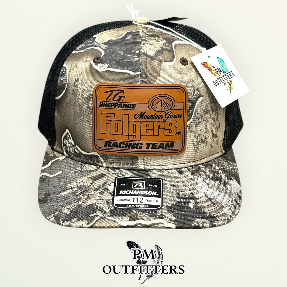 TG Sheppard Folgers Racing Team custom laser-engraved leatherette patch on Richardson 112 Realtree Excape camo and black mesh trucker hat, view 3
