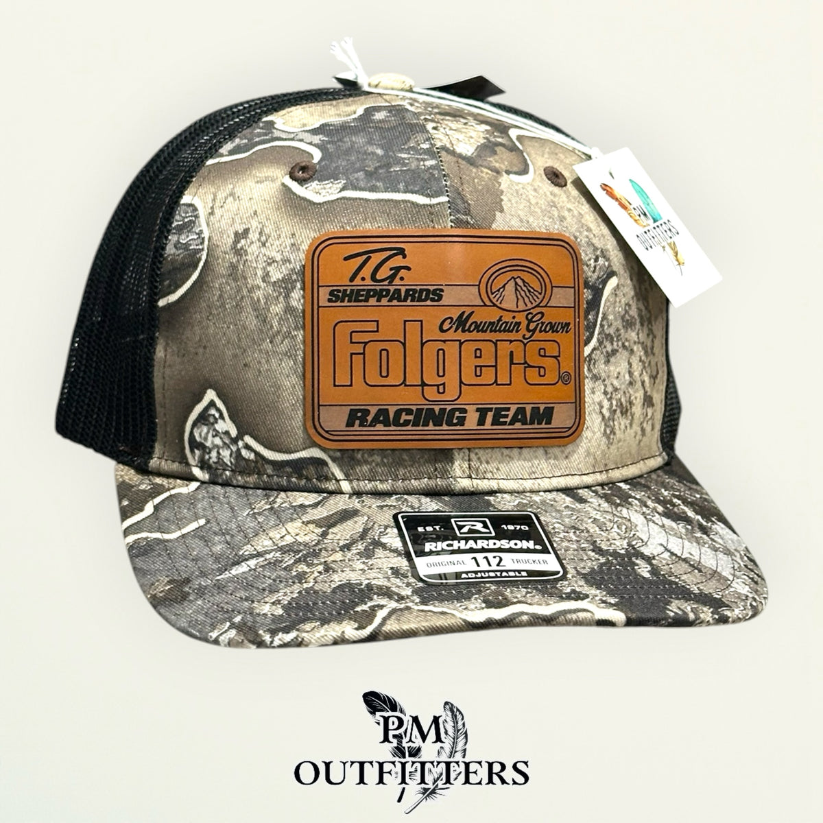 TG Sheppard Folgers Racing Team custom laser-engraved leatherette patch on Richardson 112 Realtree Excape camo and black mesh trucker hat, view 4