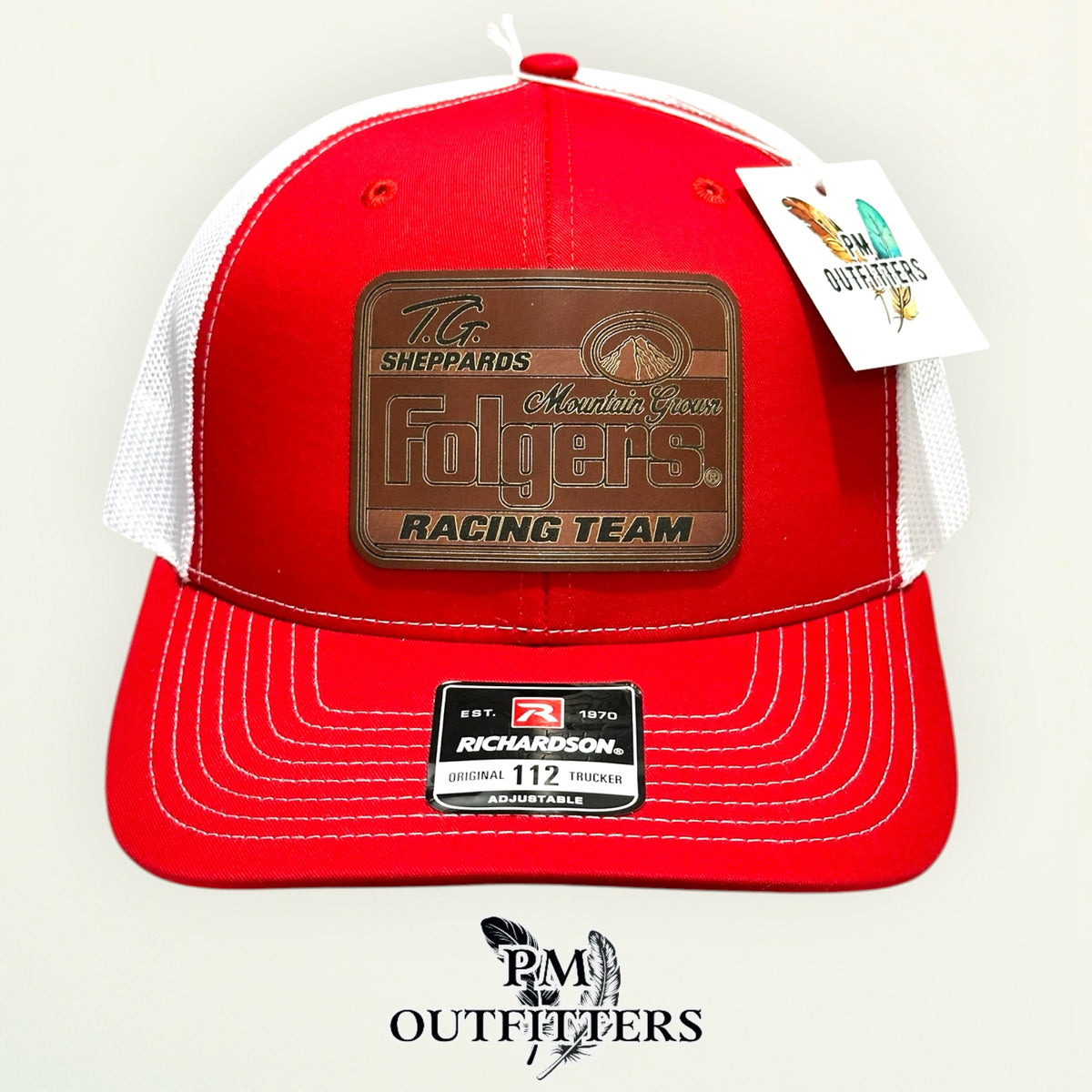 TG Sheppard Folgers Racing Team custom laser-engraved leatherette patch on Richardson 112 red and white mesh trucker hat, view 2